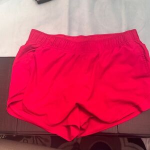 red shorts